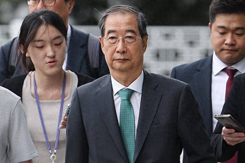 皇冠信用網代理流程_韩国前国务总理韩德洙接受特检组传唤调查